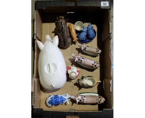 A collection of ceramic pigs ornaments (12)