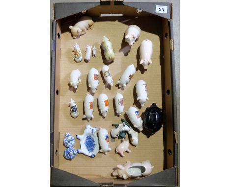 A collection of ceramic pig ornaments to include many Shield back items  