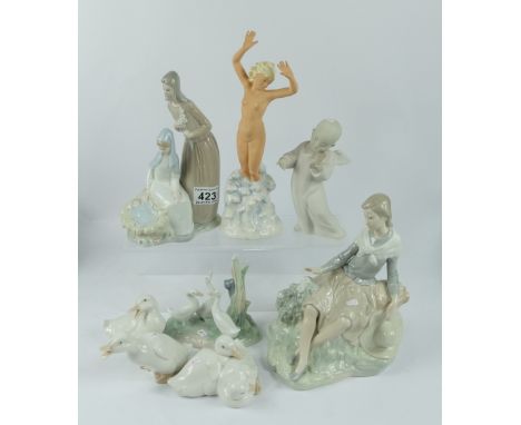 A collection of figures to include Nao Lady sitting on a rock with hat, 21cm height, Nao Nativity, Wagner & Appelt figure of 