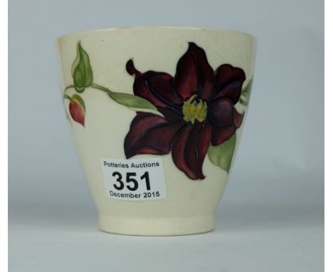 Moorcroft planter decorated in the clematis design on cream ground, height 12cm (crazing)