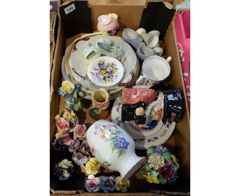A collection of pottery to include Pottery flower pots, Spode fortuna items, Chelsea pensioner toby jug, Christmas plates etc