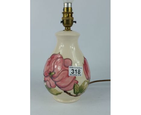 Moorcroft lamp base decorated in the magnolia design, height 31cm 