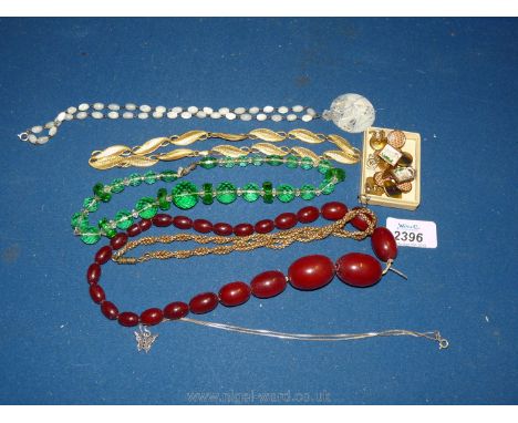 Miscellaneous vintage beads, cufflinks, earrings and a silver chain with butterfly