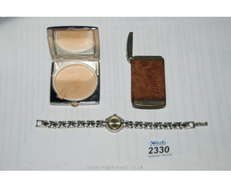 A compact leather bound Vesta case and a watch