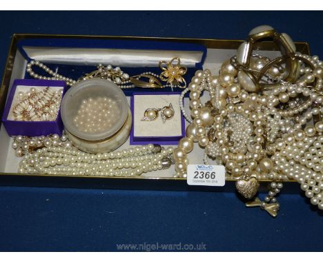 A quantity of Costume Jewellery including cold water pearls,ear-rings etc.