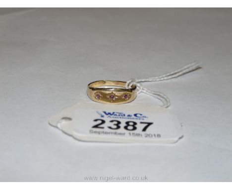 A 9ct. gold Gypsy style Ring set with tiny amethysts, size O, 2 gms