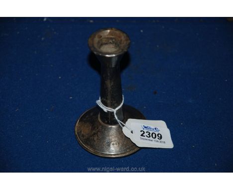 A small silver candlestick, 4 1/4" tall