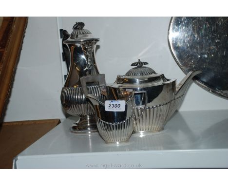 A Mappin & Webb teapot, milk jug and a Britanoid coffee pot