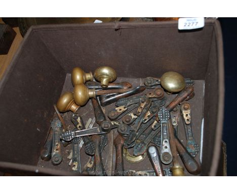 Six brass handles and twenty-eight vintage stair carpet clips