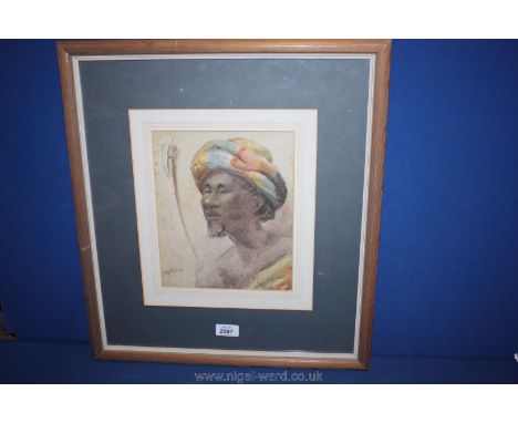 An indistinctly signed Portrait of a bearded North African warrior.