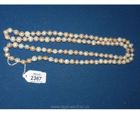 A long natural pearl necklace