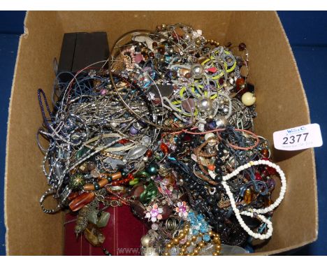 A box of miscellaneous costume jewellery and empty boxes