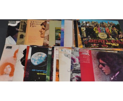 A collection of approx 20 vinyl LPs, mainly 1970s contemporary, including The Beatles, Donovan, and Bob Dylan