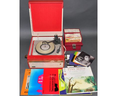 A vintage Monarch Spinney record player, together with a quantity of albums (mainly Greek music) and singles