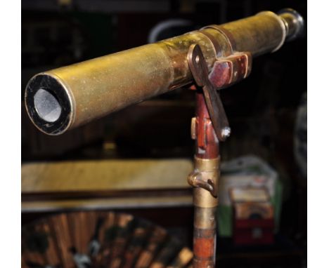 A nautical brass telescope on adjustable brass mounted tripod by W.Ottway Co. Ealing, 1903
