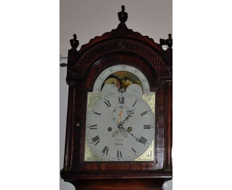 An early 19th century ebony banded mahogany longcase clock, the painted arch dial with moonphase, seconds dial and date apert