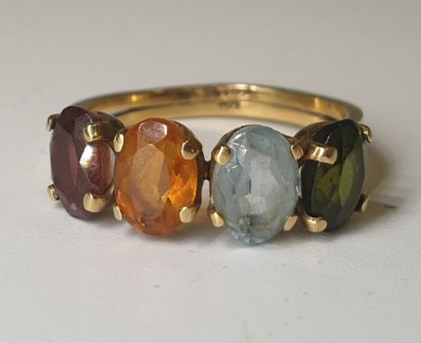 14K yellow gold ring set with tourmaline  (red & green) aquamarine,& citrine.Weight: 3g          Ring Size: E.U 52 1/2   UK M