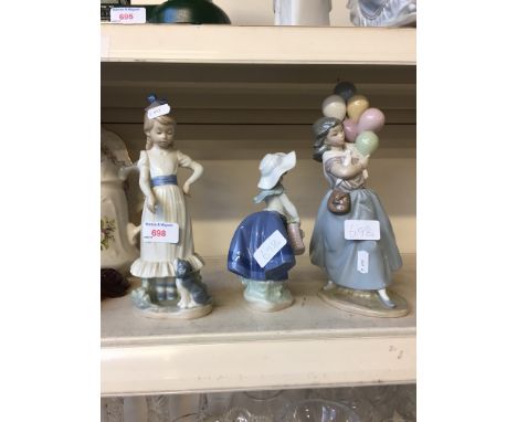 TWO LLADRO FIGURES AND A NAO FIGURE, TALLEST 27CM J4 CONDITION - girl with dog hand broken, no further damage/repair, minor w