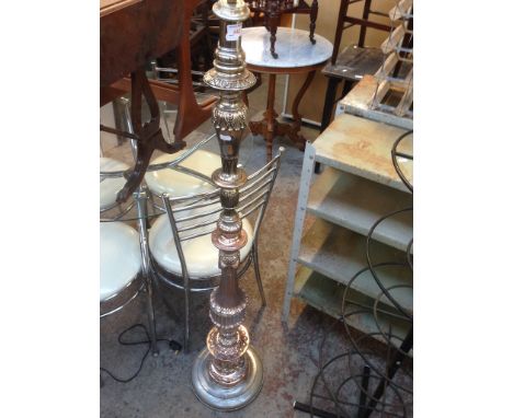 AN ORNATE LAMP STAND