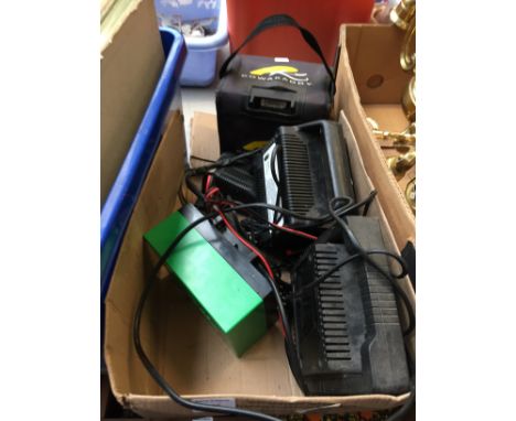 A BOX OF CADDY BATTERIES AND BATTERY CHARGERS