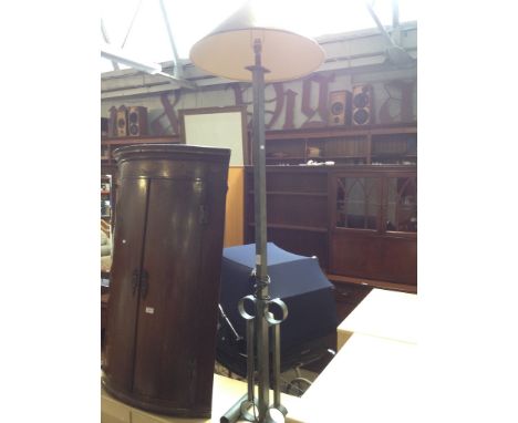 A modern metal standard lamp. H160cm.