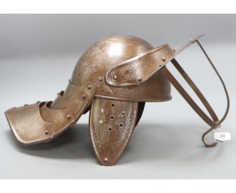 A reproduction English Civil War lobster tail helmet, length 49cm approx.