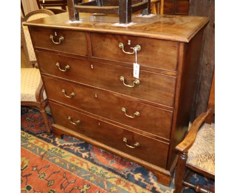 A George III chest of four long drawers, W.100cm, D.44cm, H.94cmCONDITION: The top has several ring marks, minor scratches an