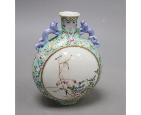 A Chinese enamelled turquoise moonflask, height 16cmCONDITION: Light surface scratches to the enamel towards the base and wea