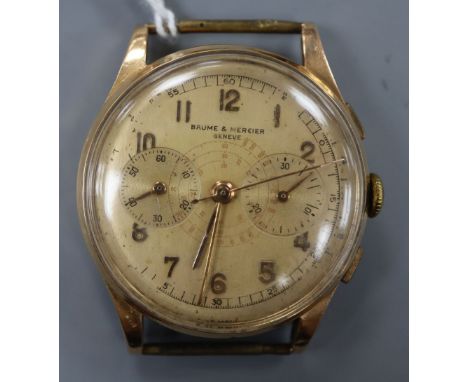 A 1950's? yellow metal Baume &amp; Mercier chronograph manual wind wrist watch, no strap, diameter 38mm, gross 40.1 grams.CON