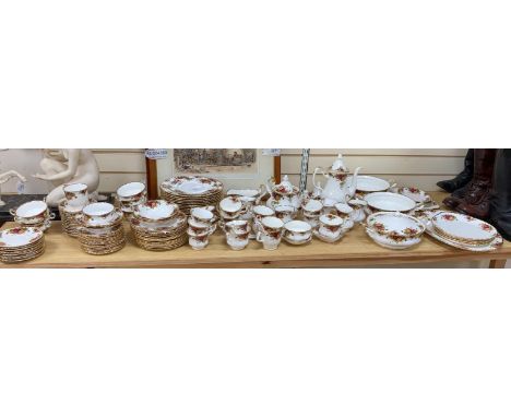 A large collection of Royal Albert Old Country Roses tableware, comprising teapot and cover, coffee pot and cover (hairline t