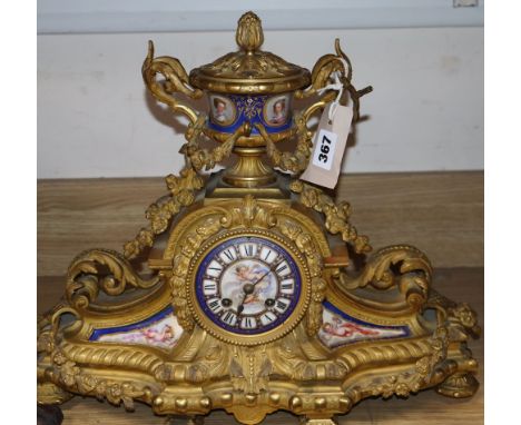 A late 19th / early 20th century French gilt metal and enamel mantel clock, height 36cm