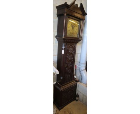 A George III oak 30 hour longcase clock, later carved, the brass dial marked John Lawson, Bradford, case later carved, W.49cm