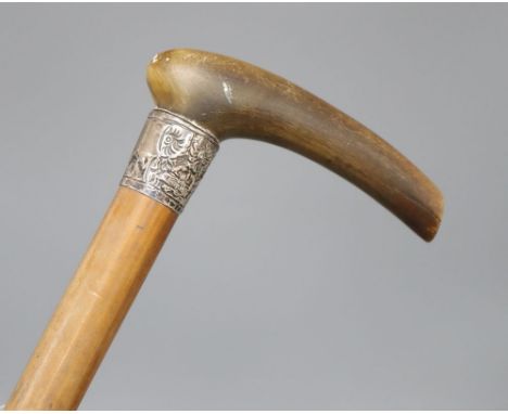 A Chinese horn and silver stick, possibly rhino horn