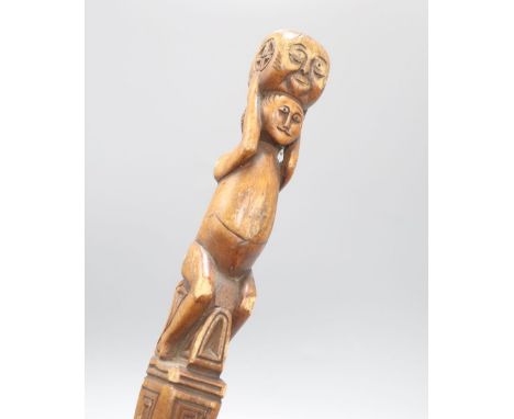 A carved fertility stick, c.1840, length 79cm