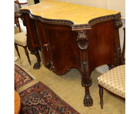 A George III style serpentine mahogany commode with faux marble top, W.145cm, D.59cm, H.101cmCONDITION: Overall good conditio