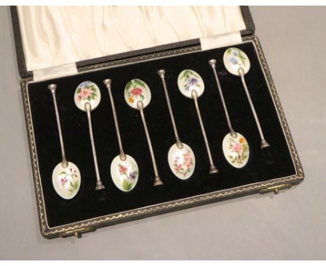 A cased set of eight silver and enamel coffee spoons, Henry Clifford Davis, Birmingham, 1957, gross 78 grams.CONDITION: One o