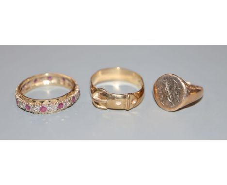 A 9ct signet ring(a.f.), a 9ct gold ruby and diamond eternity ring and a 9ct gold buckle ring, gross 10.3 grams.