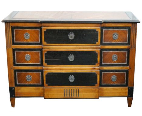 BIEDERMEIER STYLE WALNUT AND EBONISED COMMODE
with a breakfront above three long central drawers, flanked by six short drawer
