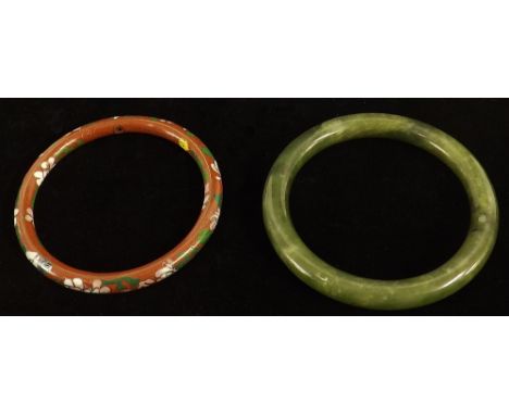 Circular jade bangle and a cloisonne foliate bangle (2)
