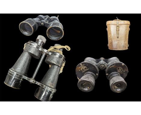 Pair of WWII Military Binoculars in tan leather case, marked A.G. & Co. Ltd. 1943 Binocular Prismatic No. 5.