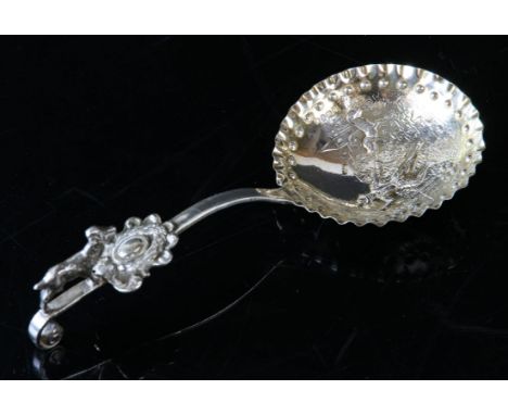 Goat finial silver caddy spoon with embossed bowl of a man walking a dog, import London 1896.