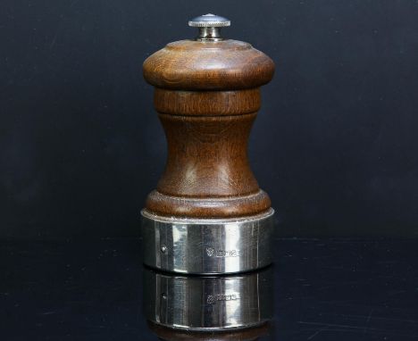 Silver branded pepper grinder by Peugeot of France, Birmingham 1976.