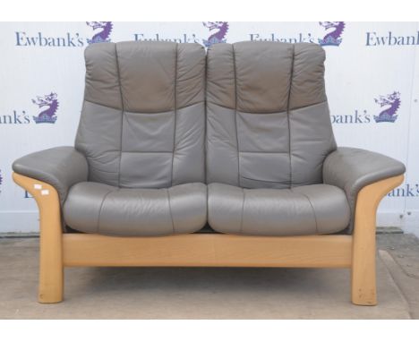 Stressless, a two seat sofa, with leather upholstery, 105cm high x 154cm wide x 83cm deepCondition Report:  There are one or 