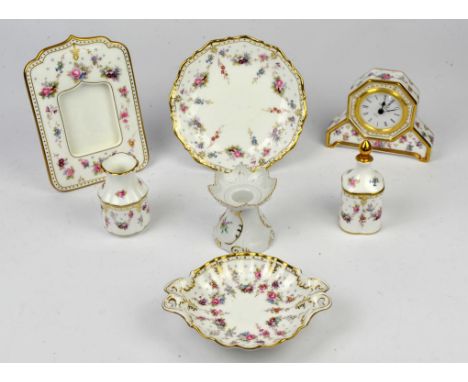 Collection of Royal Crown Derby porcelains, to include a clock, picture frame, smaller perfume bottle and stopper, tazza and 