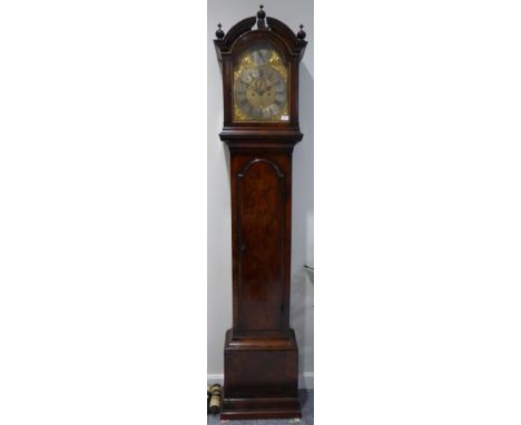 A Walnut Eight Day Longcase Clock, 18th century and Later, broken arch pediment with later ball finials, fluted canted corner