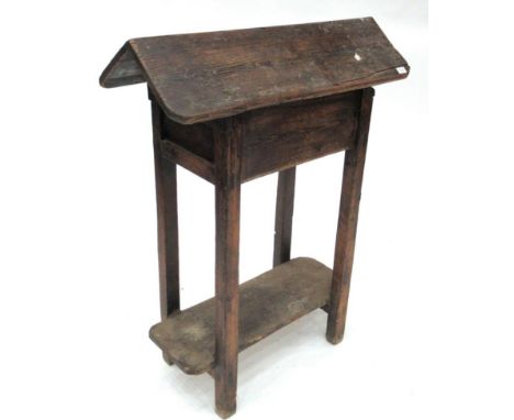 A Pitch Pine Saddle Horse, 2nd quarter 19th century, the angled top above a single frieze drawer stamped LEL, raised on squar