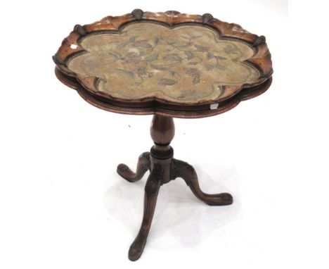 A George II Style Walnut Scallop Edge Top Tripod Table, the moulded top decorated with anthemion enclosing a curved needlewor