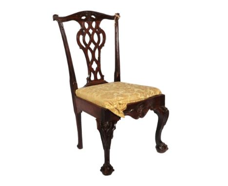 An 18th Century Portuguese Padouk Wood Chippendale Style Dining Chair, with an acanthus carved top rail above a pierced splat