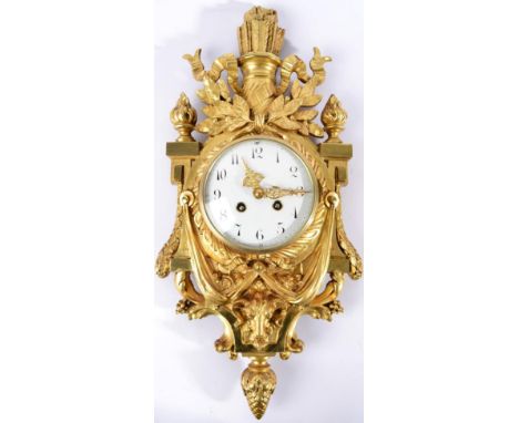 A Gilt Metal Striking Cartel Clock, circa 1890, floral, swag and rams head decorated case, 4-3/4-inch Arabic enamel dial, twi