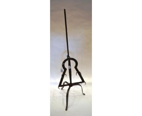 A Wrought Iron Adjustable Lark Spit, with acorn finial and six pairs of prongs, on a tripod base, 86cm high]